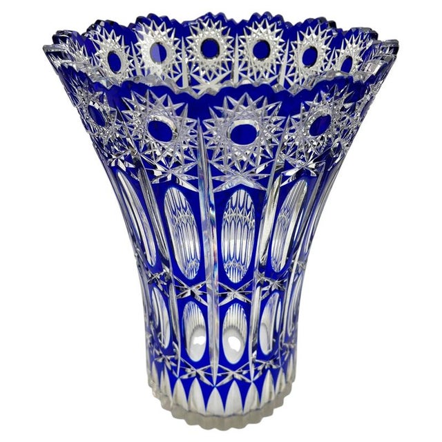 Large Vibrant, Cobalt crystal vase Cut-to-clear in the Bohemian style with cut-to-clear decoration of palms and Stars. The...