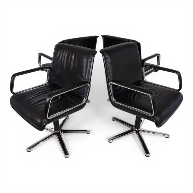 A set of four original Wilkhahn Delta chairs from the later production generation – a timeless design classic from the...