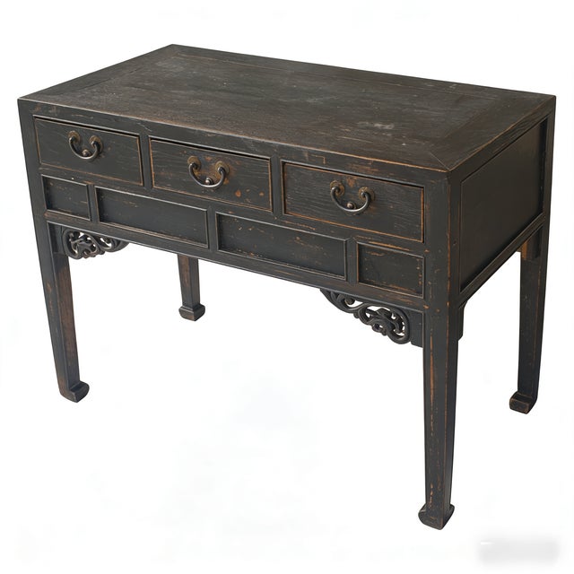 This 19th century elegant console table features a classic three-drawer configuration, each fitted with traditional brass...