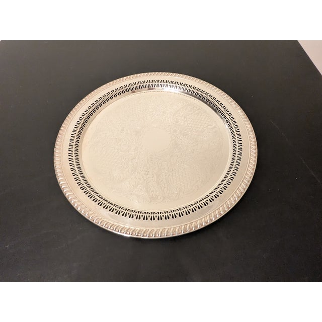 Vintage Leonard 15" Round Silverplate Platter This ia a vintage Leonard Silver Plate 15-inch round serving platter. This...