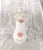 This is a smaller white chocolate pot with pink flowers. It is not marked, the base is only numbered 278. It has a lit...