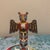 An eye-catching, vintage-inspired miniature totem pole crafted from durable molded plastic. This decorative piece features...