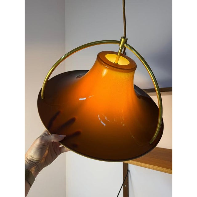 A true masterpiece of the late 1970s: The Single pendant lamp is a design by star designer Jo Hammerborg for the renowned...