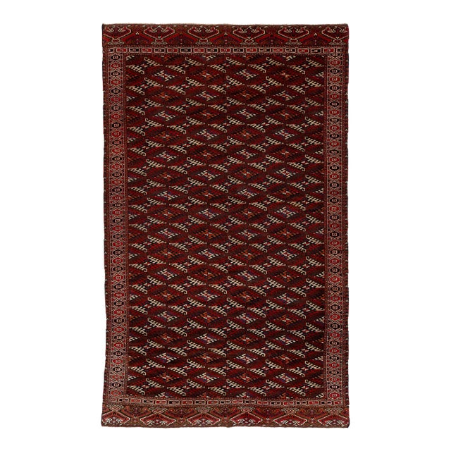 Antique Turkmen Yamoud Wool Rug With Diamond Lattice and Eagle Motif Borders For Sale