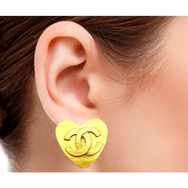 This is part of Chairish’s Costume Jewelry assortment. Chanel Vintage Gold Plated CC Heart Clip on Earrings *Marked 95...