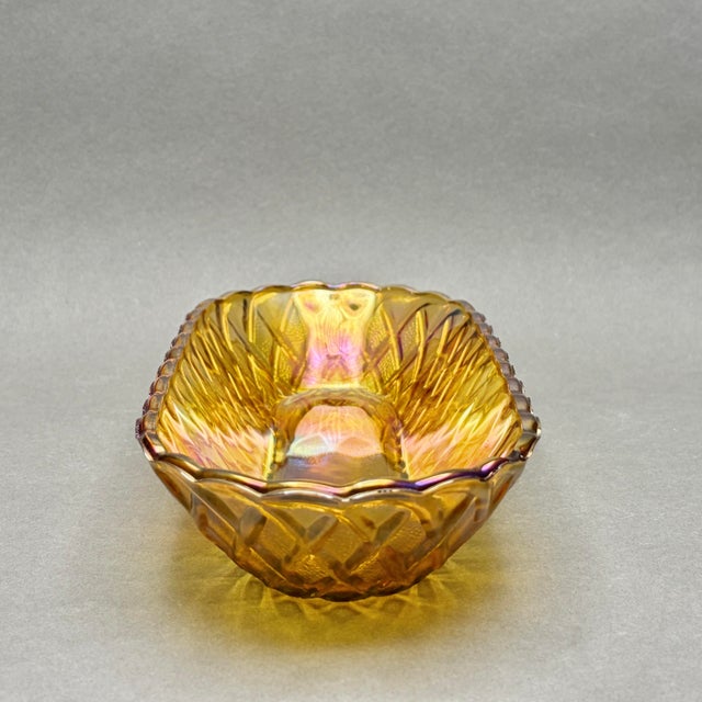 This beautiful vintage oval celery dish by Indiana Glass features a vibrant marigold carnival glass finish with a striking...