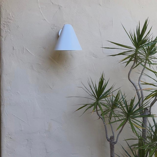 'ZuZu' White Painted Brass Wall Sconce in the Style of Jacques Biny An exclusive made for U.S. and UL listed wall sconce...