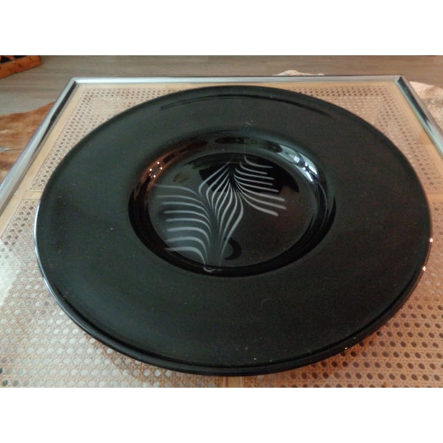Large black italian hand blown centerpiece plate. Most likely Murano. Feathery white pattern in center area Label reading...