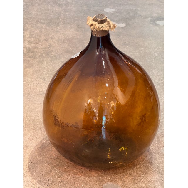 An Amber Glass Demijohn, Labeled Eau De Vie 1881 For Sale - Image 4 of 5