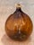 An Amber Glass Demijohn, Labeled Eau De Vie 1881 For Sale - Image 4 of 5