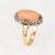 Stylish antique Victorian angel skin coral & diamond ring (circa 1880s to 1900s) crafted in 18 karat yellow gold. Cabochon...
