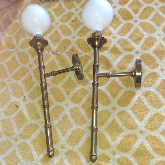 Pair 1950's French Mid Century Modern Bronze Bamboo Wall Sconces by Maison Bagues. This is a large and spectacular pair of...