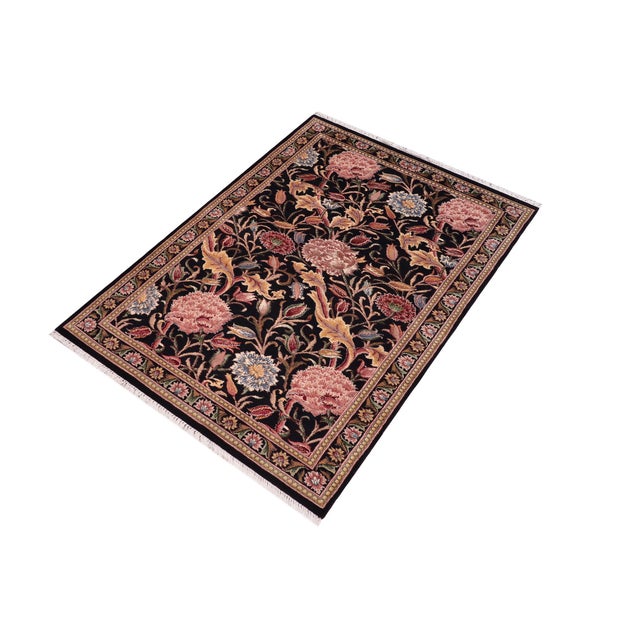 Designed with mesmerizing intricacy and gorgeous color palette, this hand-knotted masterpiece demonstrates the beauty and...