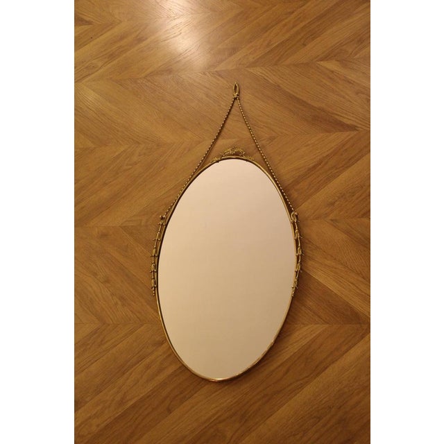 Mid-Century Modern Oval Brass Wall Mirror with Neoclassical Decoration and Brass Chain, 1950s For Sale - Image 3 of 17