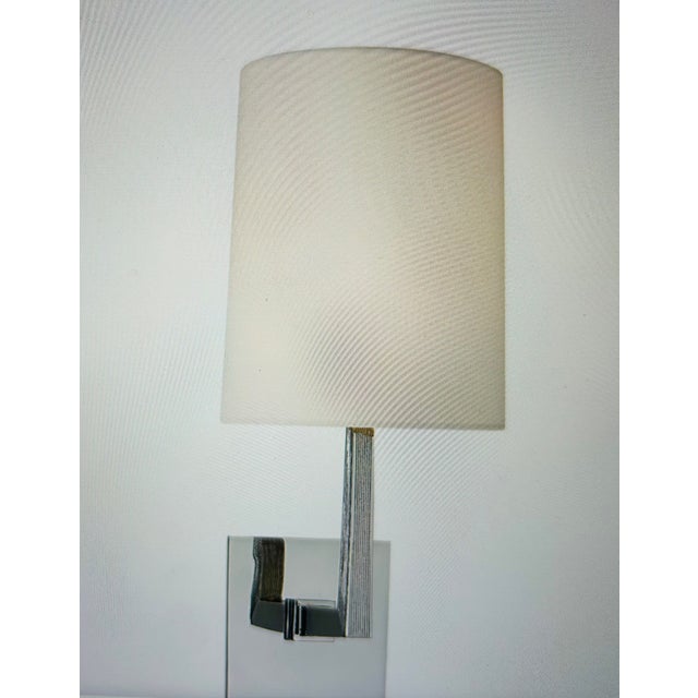Three brand new sconces by Visual Comfort still in their boxes, never used. Square Tube Single Sconces in Polished Nickel...