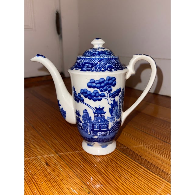 Gorgeous circa approximately early-1900s Blue Willow coffee pot, creamer jug and sugar set. In near mint condition, save...