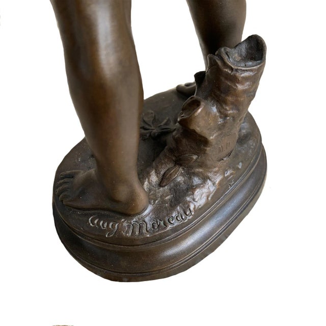A fine late 19th century French bronze in the form of a boy playing the mandolin. It is signed Aug Moreau and titled...