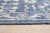 This hand knotted pile rug features a primary blue color palette and is crafted from a blend of wool and bamboo silk....