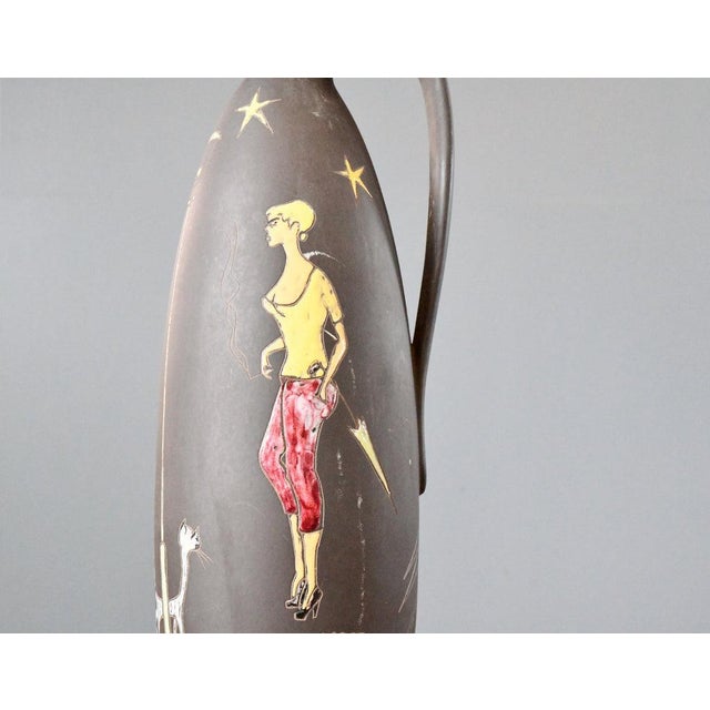 Handmade Ceramic 'Paris' Pitcher by Keto Keramik Circa 1950s Black pitcher with external images - Handmade ceramic -...