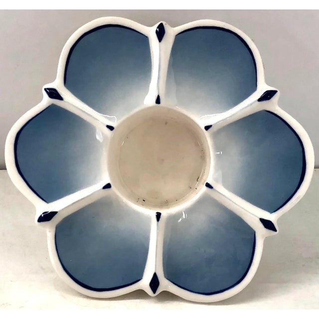 Beautiful six petal flower design in gradually fading intensity of blue by Villeroy & Boch. These lovely candle holders...
