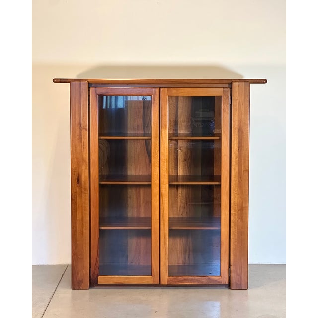 Display cabinet designed by Mario Marenco for Mobil Girgi in the 70s, walnut wood This piece has an attribution mark, I am...