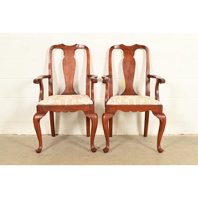 An outstanding pair of Queen Anne or Georgian style armchairs or dining captain chairs By Henkel Harris USA, Circa 1970s...
