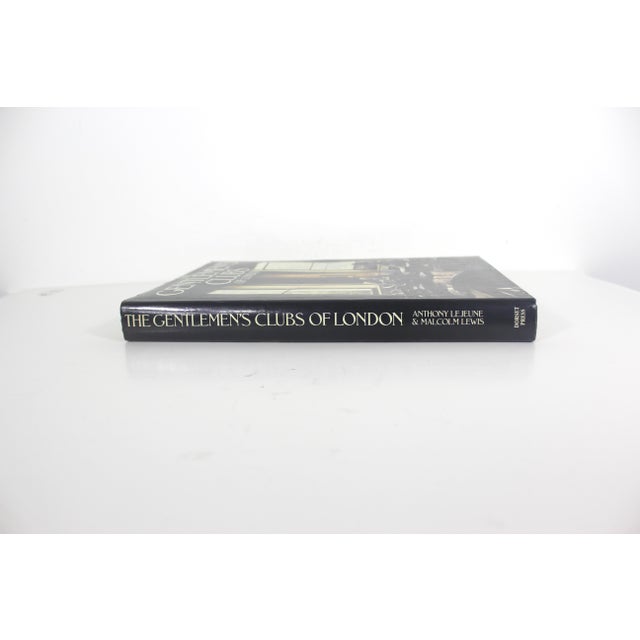 Large hard cover coffee table book with dust jacket. There is a tear in the dust jacket, some bent pages and yellowing of...