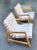 Vintage pair of Mid-Century Modern Jens Risom web lounge chairs. Classic early edition of Jens Risom's iconic webbed...