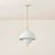 Influenced by midcentury design, Jojo features a dome-shaped shade with decorative perforations that allow light to...