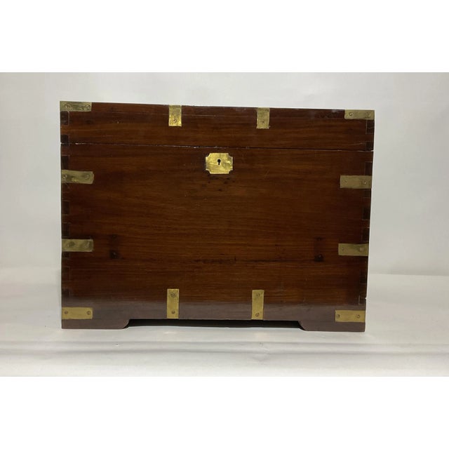 Teak and Brass nautical chest with inlaid brass corners, inlaid keyhole brass, carry handles, corners. etc., Weight: 36...