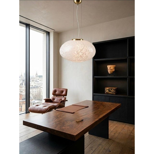 Elevate your space with this exquisite, authentic vintage pendant light by Venini, the legendary masters of Murano glass....