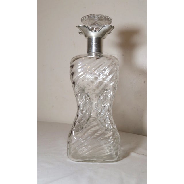 Up for sale is a very high quality antique Thomas Latham & Ernest Morton sterling and blown glass liquor decanter made in...