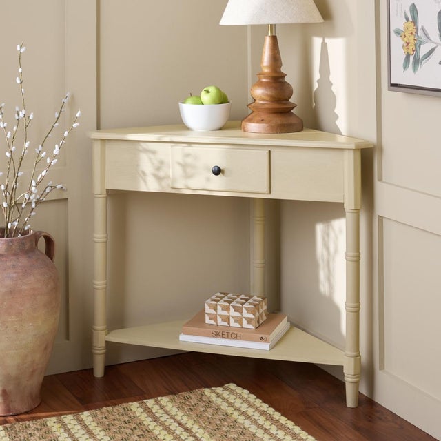 This Gomez Table was designed with small living spaces in mind. Gomez's triangular pine wood frame easily fits into any...