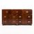 This is a 1970s campaign style walnut and brass chest by Baker Furniture Company. Known for their commitment to...