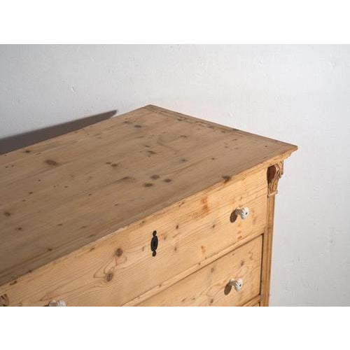 Antique rustic chest of drawers made of solid pine wood and dating to around 1900, originating from Central Europe.This...