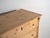 Antique rustic chest of drawers made of solid pine wood and dating to around 1900, originating from Central Europe.This...