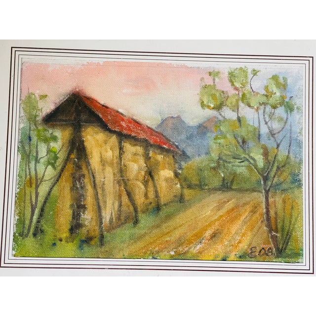 Pair of vintage Austrian watercolor landscapes on laid canvas paper, signed and framed.