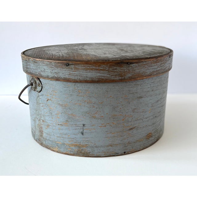 This is a beautiful powder blue color Early 19th Century Antique New England Bail Handle Pantry Box in it's original pale...