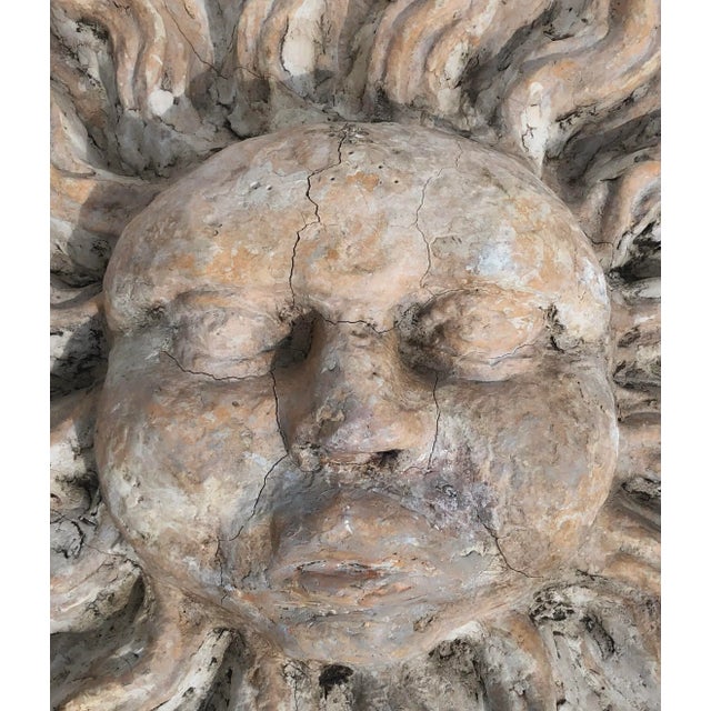 A wonderful Majorcan style cast stone sunburst wall mounted art, designed by Quatrain for Fournir Collections, will add a...