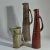 Rare group of six whimsical jugs / vases with long downward ears in various heights with earth tone glazes. They are like...