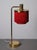 Brass table lamp with red fringes produced by Hans-Agne Jakobsson in Markaryd, Sweden, 1960s. New wiring. This piece is...