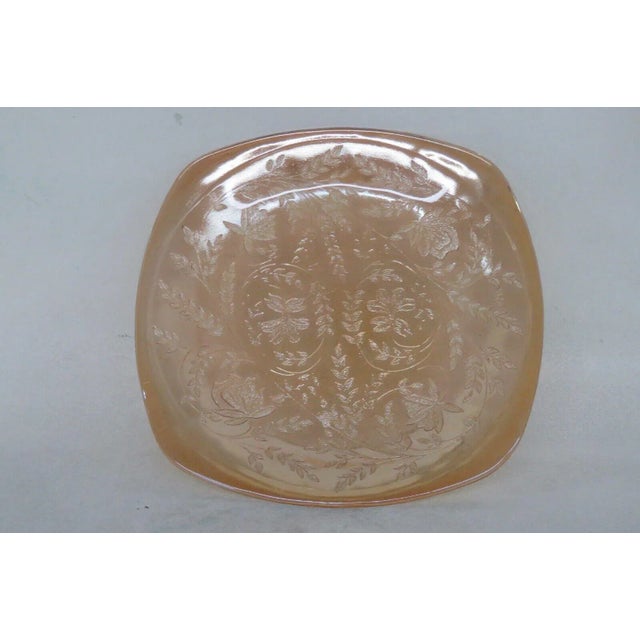 This lovely plate is made of glass. This plate features the wonderful Floragold / Louisa pattern used by Jeannette Glass...