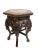A Chinese 19th century side table or plant stand with marble top. A hexagonal top and round shape, bent legs underneath...