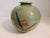 This is a Japanese vase with four cabbage leaf impression panels. Each panel has a raised hand painted floral design. Vase...