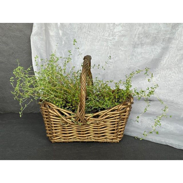 Use this vintage woven wicker basket as a decorative storage container in an entry foyer, laundry room, craft studio,...