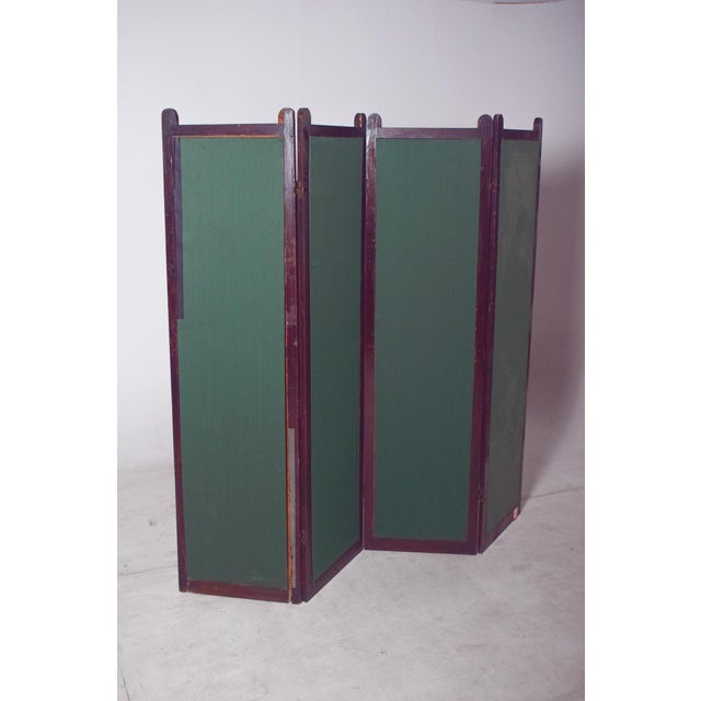 This Portuguese folding screen, crafted in wood and upholstered with green fabric, is a versatile and elegant decorative...