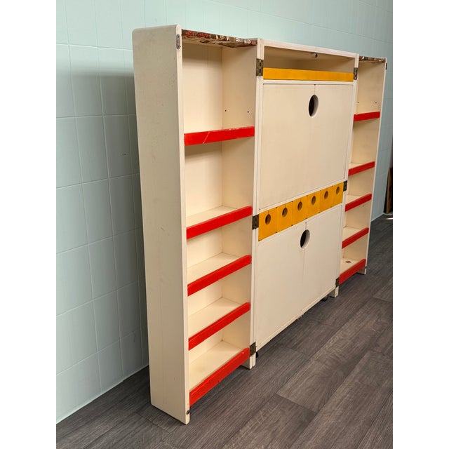 This unique piece of furniture was designed by an architect and crafted by a craftsman in the 1960s. It is a kitchen...