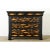 Dimensions: 34 ½” H x 45 ⅝” W x 18 ½” D Recently updated with decoupage as schools of fish over an ebonized (painted...