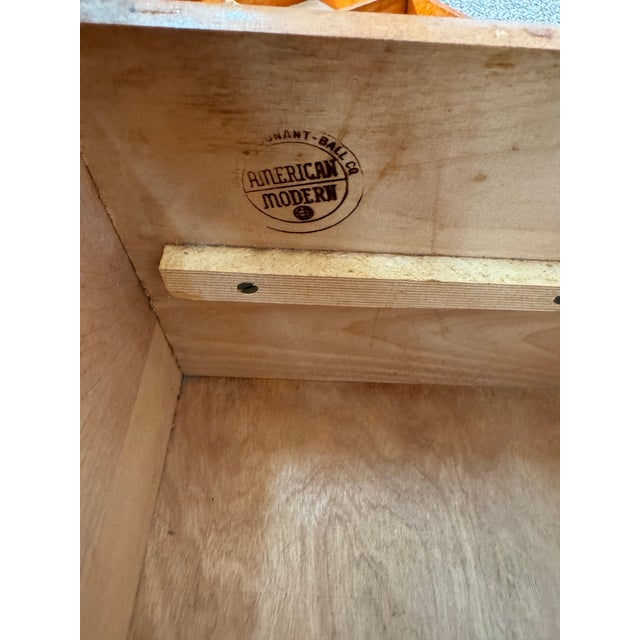 Nightstand made by Conant Ball and designed by Russel Wright. The nightstand has a great style and design. Stand has some...