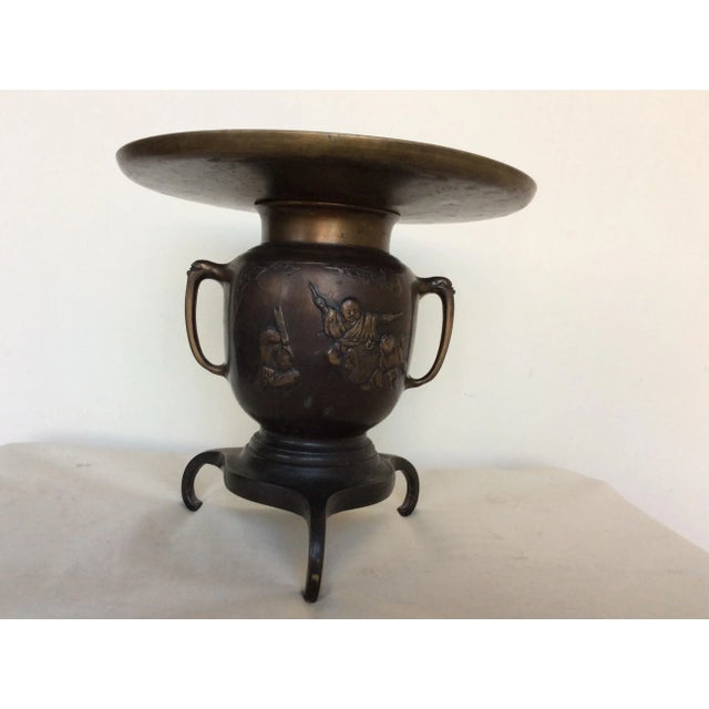Beautiful antique bronze Asian incense burner or censor. This has two pieces the top and the footed base.